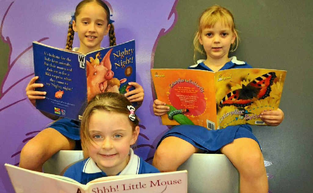 WWSS Year 2 students Christie Lyons, Georgia Wilhelmi and Jessica Mullaly enjoy reading in their new library with creative wall artwork by children’s’ author Steven Michael King. WWSS Year 2 students Christie Lyons, Georgia Wilhelmi and Jessica Mullaly enjoy reading in their new library with creative wall artwork by children’s’ author Steven Michael King.